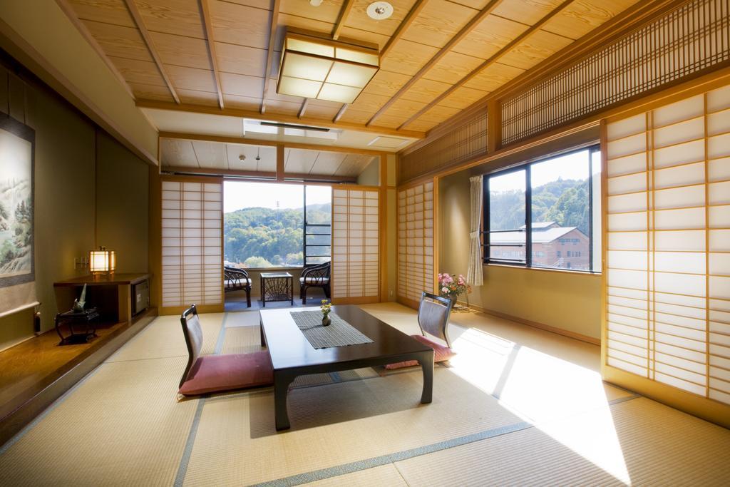 Hotel Yura No Yado Seifuen à Achi Extérieur photo