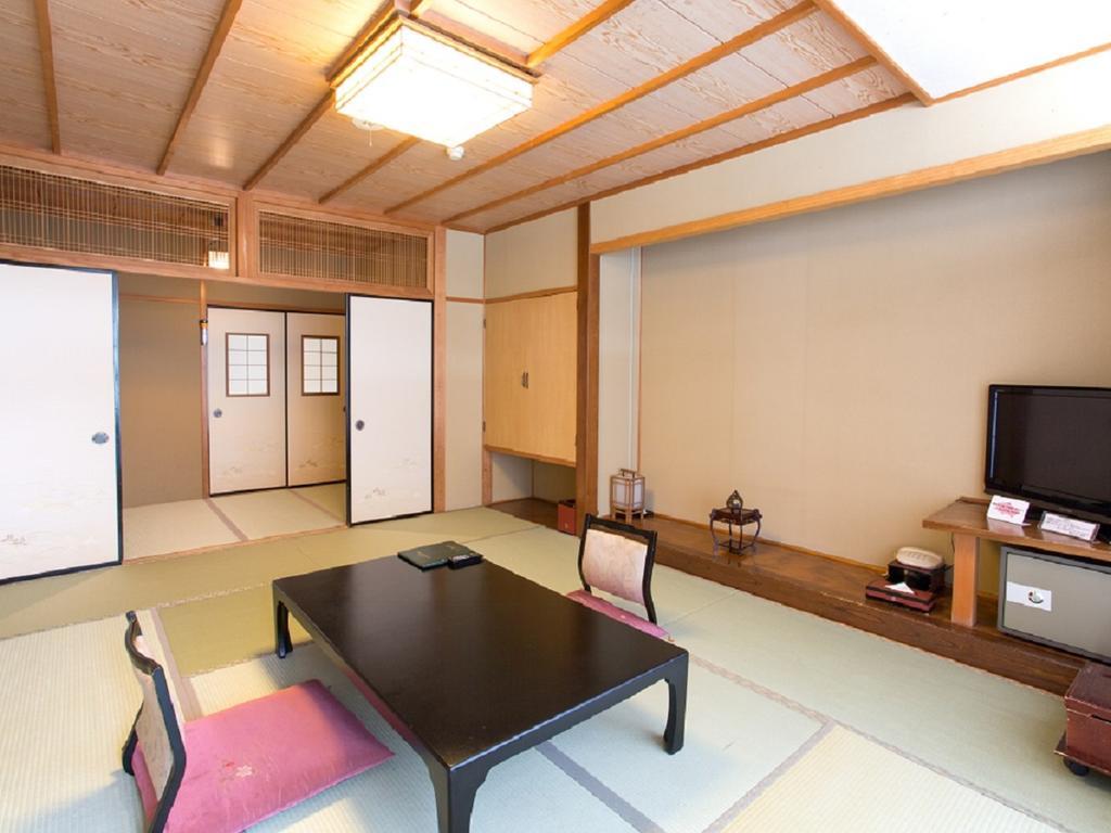 Hotel Yura No Yado Seifuen à Achi Extérieur photo
